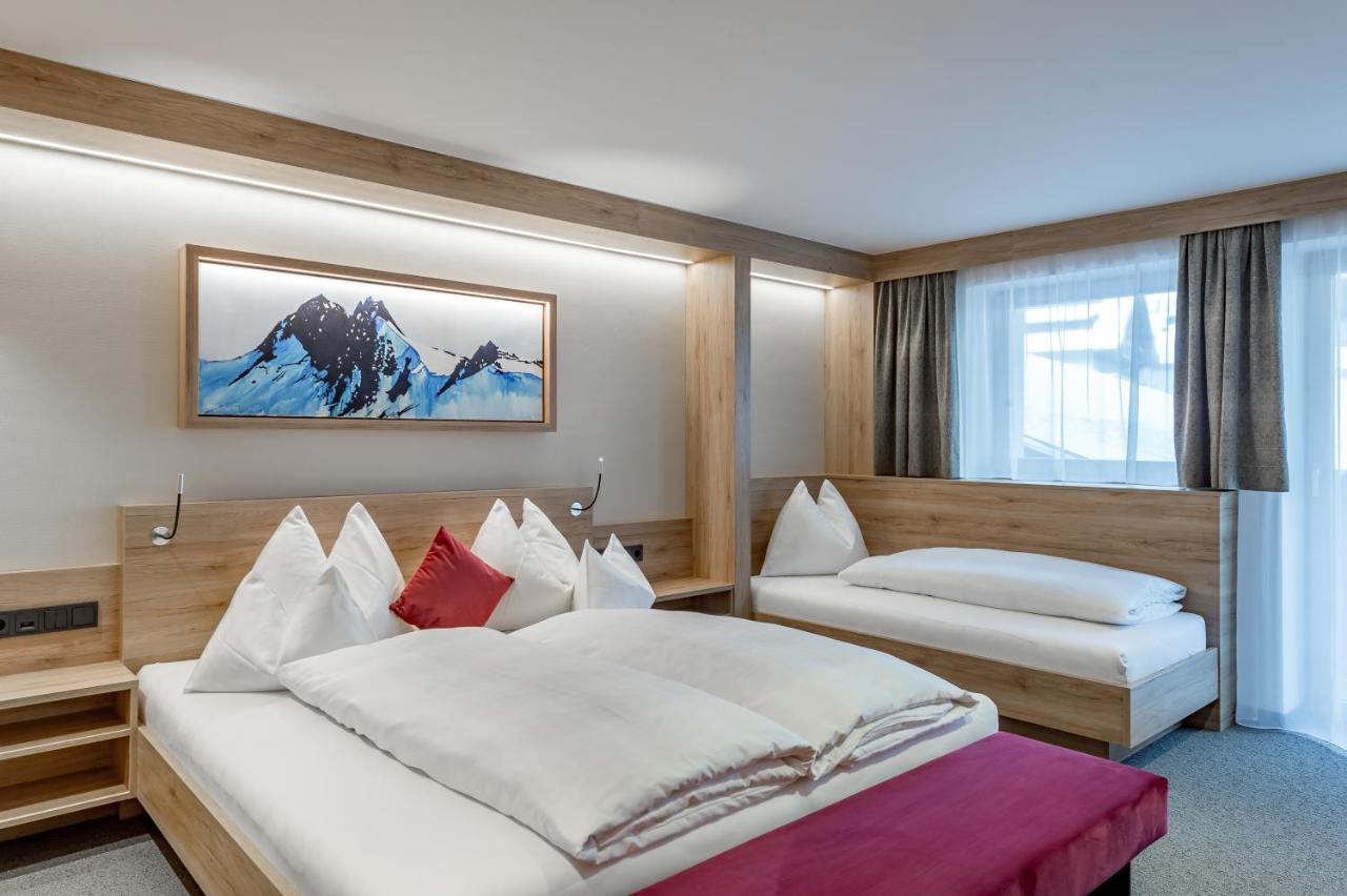 Dreibettzimmer mit Balkon